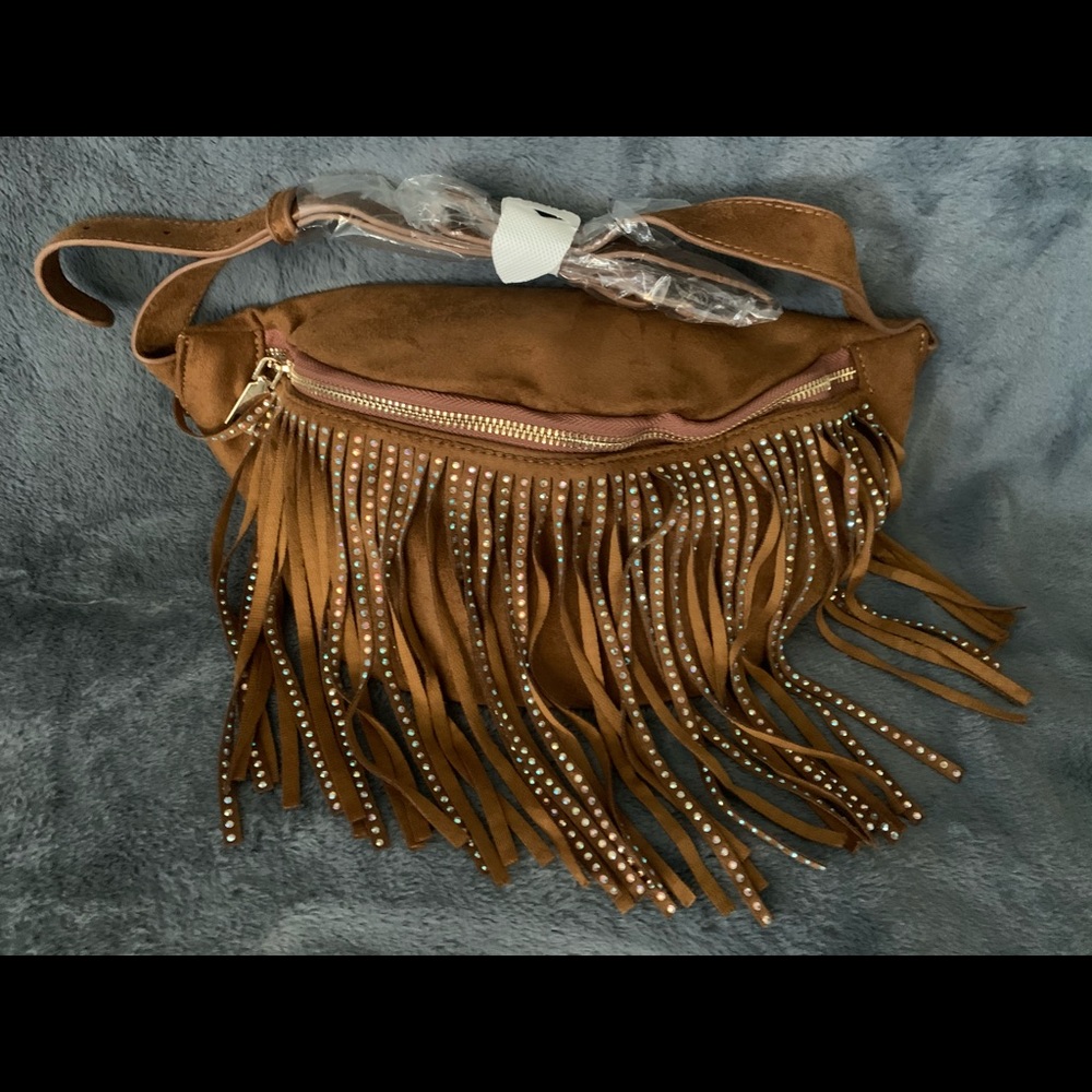 Oversized velvet feel fanny pack with fringes.